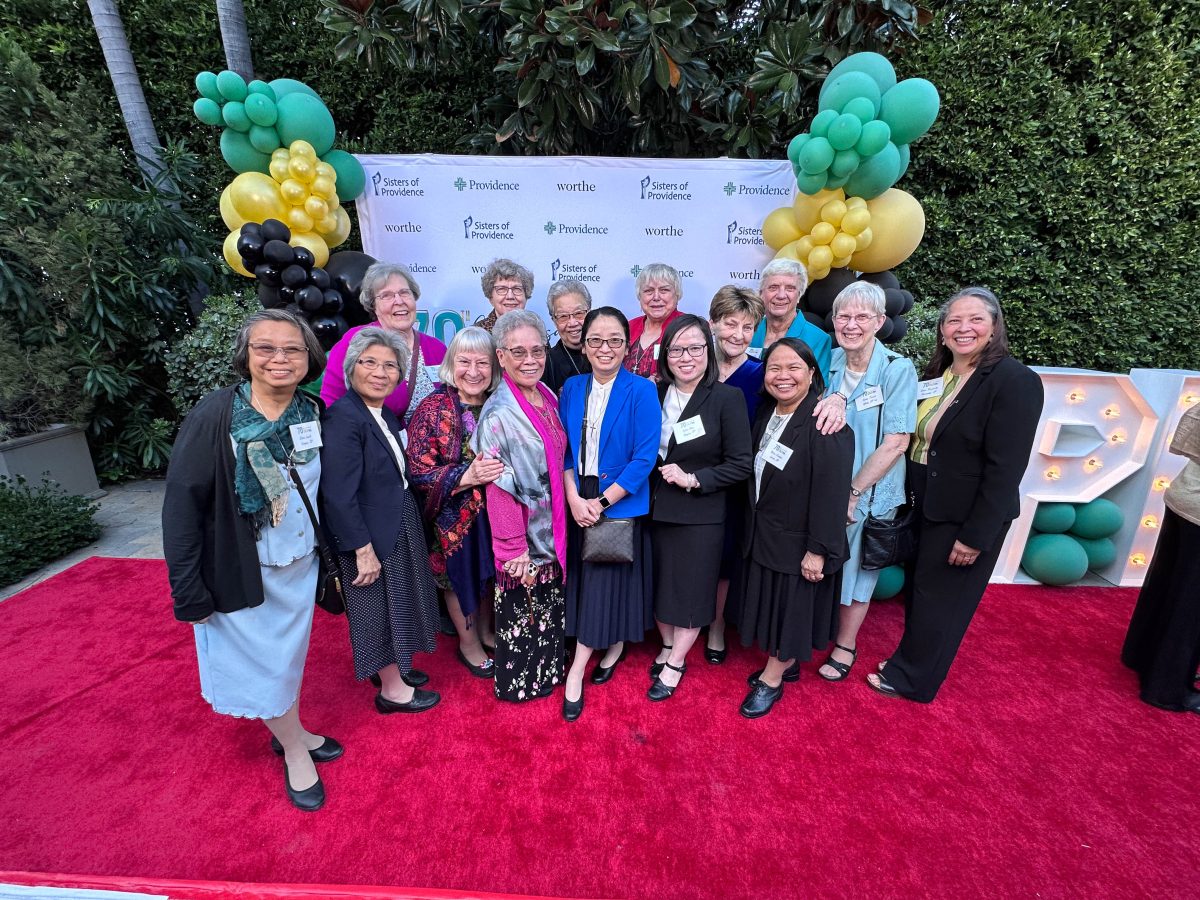 a group of women at a gala event