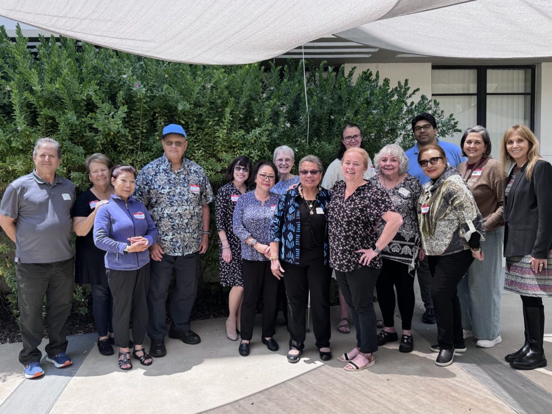 A group of Providence Associates poses for a group picture.