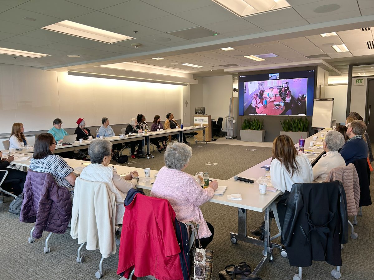 Sisters of Providence meet with administrative staff members.