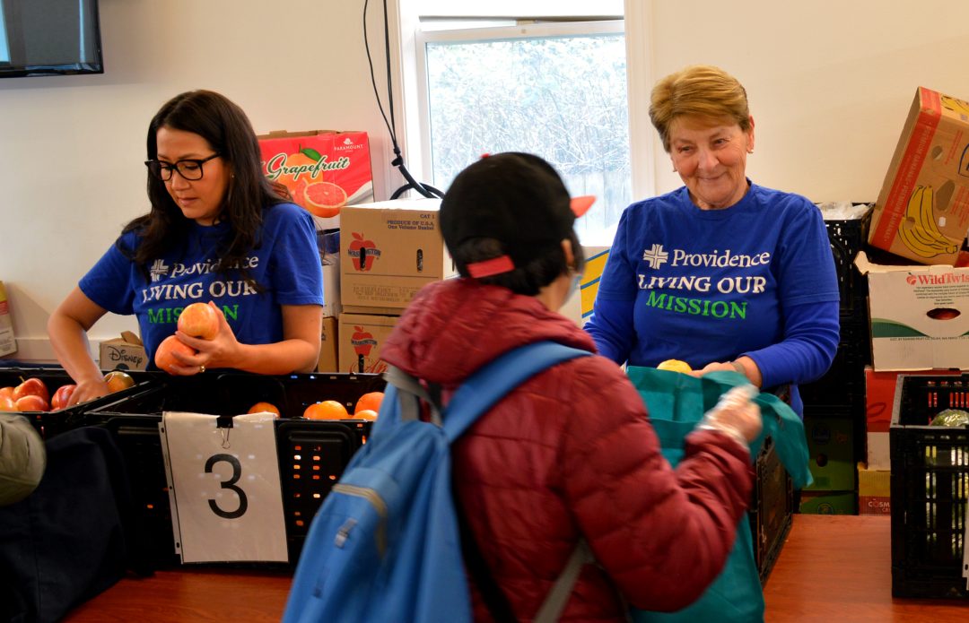 Sr. Susanne Hartung serves at a food bank.