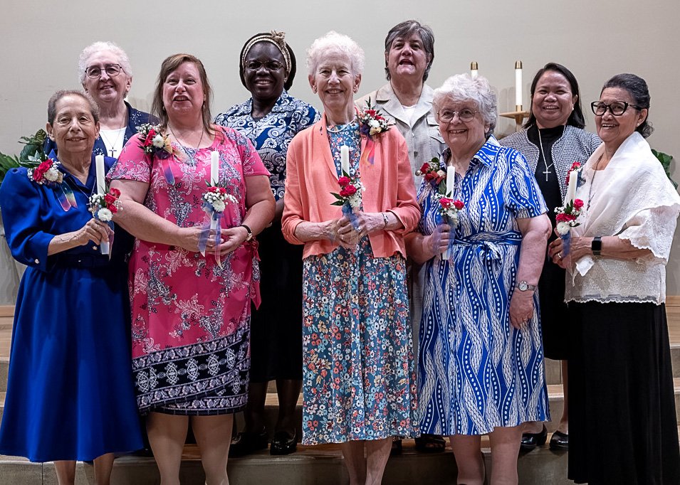 Nine Sisters of Providence pose for a group portrait at the 2026 Jubilee Mass.