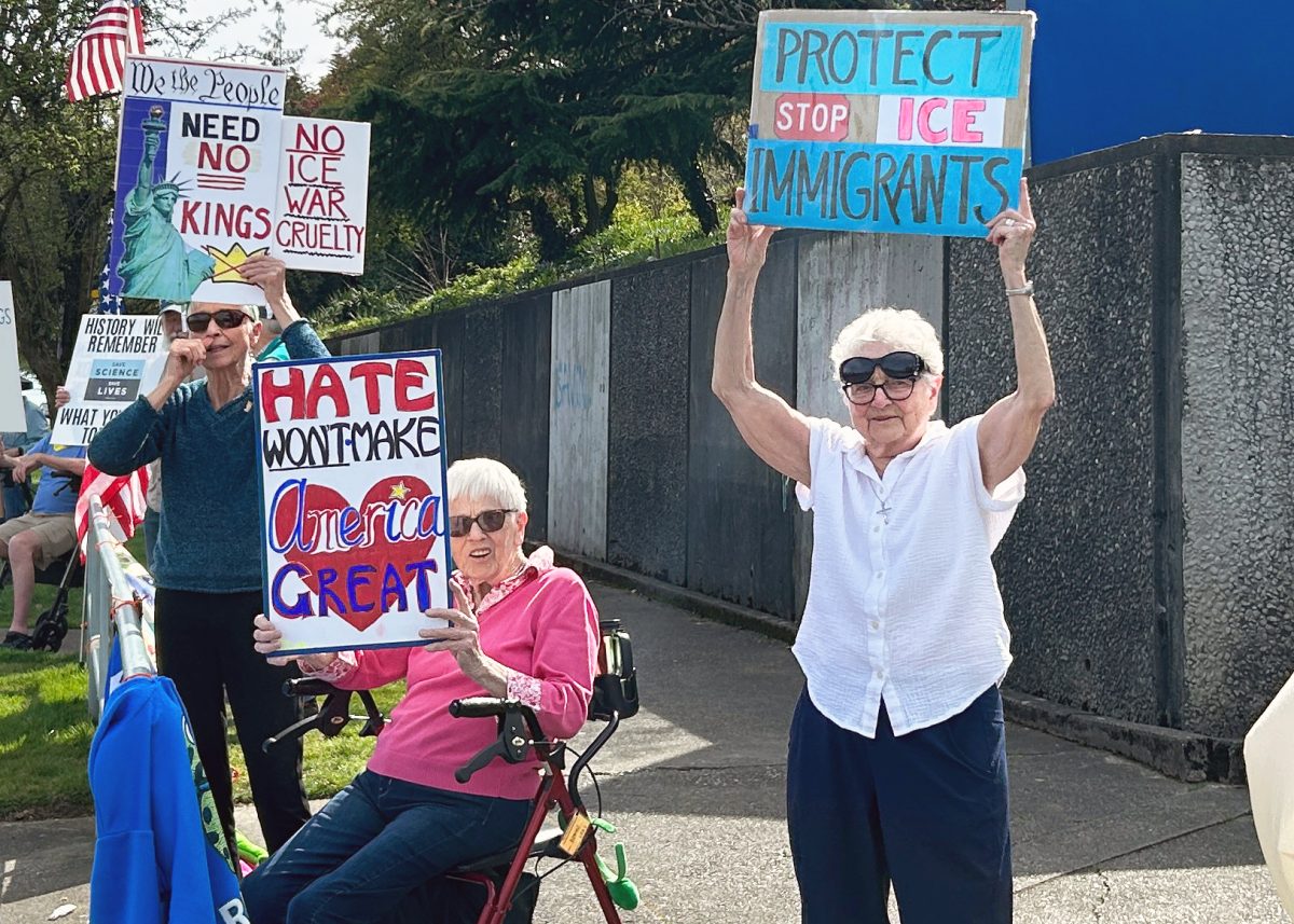 Sr. Charlene Hudon participates in a roadside protest.