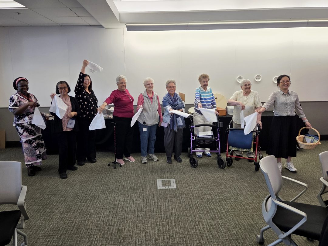 Sisters of Providence celebrate during a community chapter meeting.