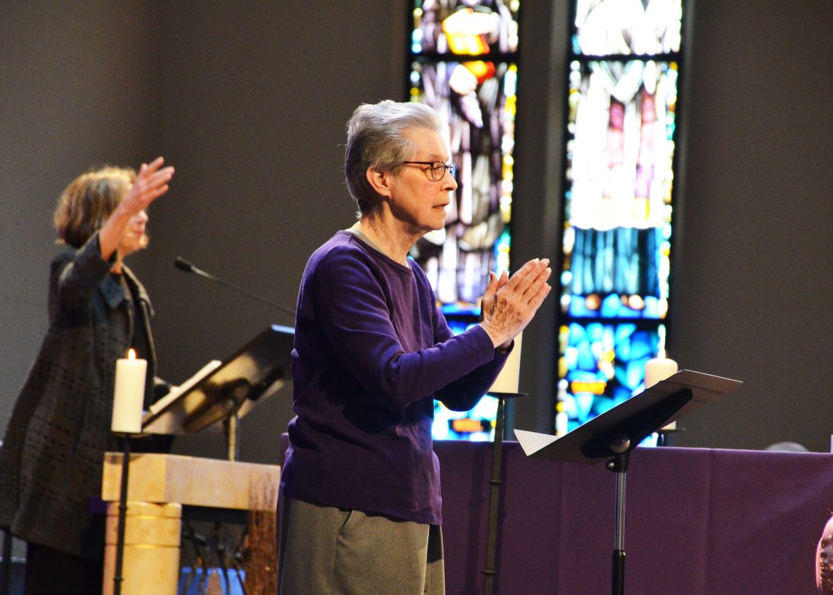 Sr. Judith Desmarais interprets a Mass using American Sign Language.