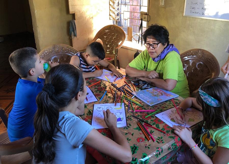 Sr. Marita Capili ministers to children in El Salvador.
