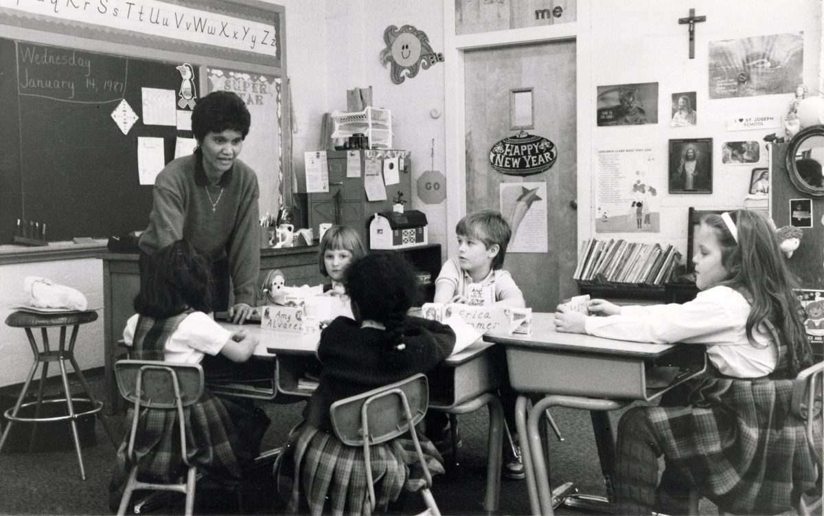 Sr. Josie Ramac teaches a classroom of children as captured in this archival photo.