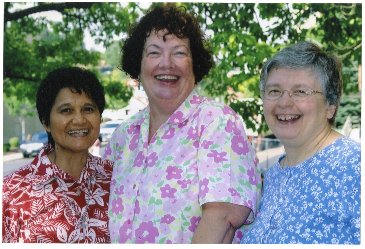Three Sisters of Providence pose together.