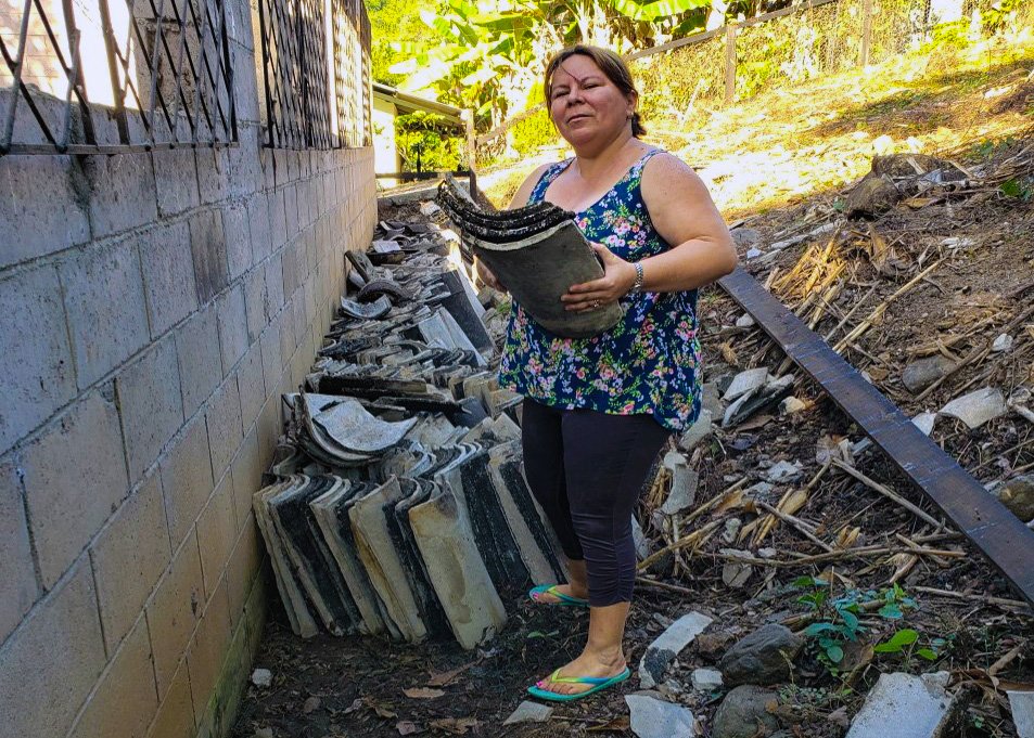 Sr. Vilma Franco repairs a house.